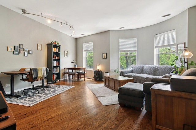 700 W Cornelia Ave Unit 3E, Chicago, IL 60657 - living room featuring track lighting and wood finished floors
