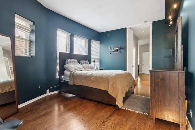 700 W Cornelia Ave Unit 3E, Chicago, IL 60657 - bedroom featuring wood finished floors and multiple windows