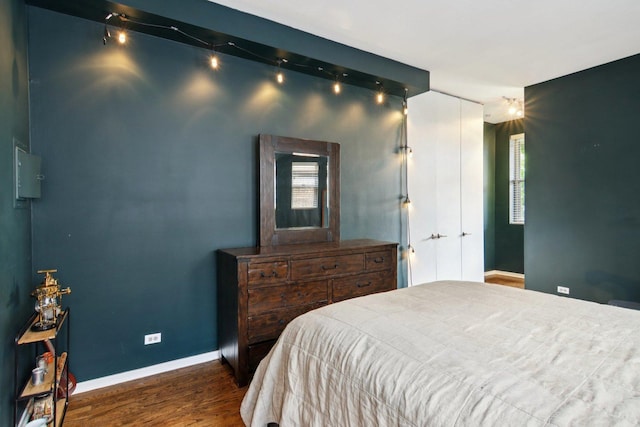 700 W Cornelia Ave Unit 3E, Chicago, IL 60657 - bedroom with wood finished floors and baseboards