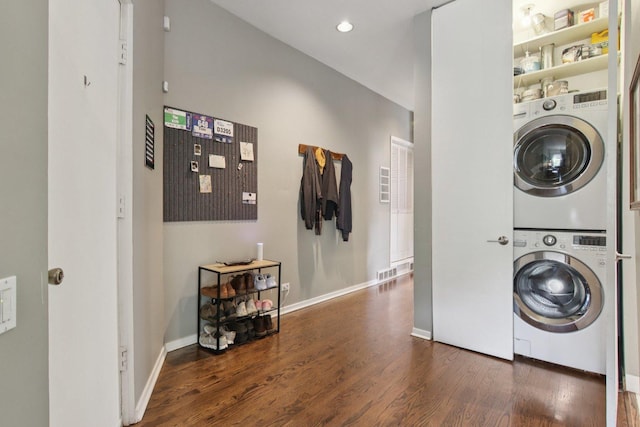 700 W Cornelia Ave Unit 3E, Chicago, IL 60657 - washroom featuring stacked washing machine and dryer and wood finished floors