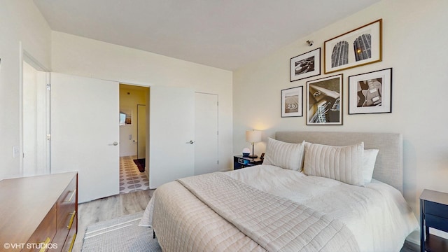 757 N Orleans St Unit 907, Chicago, IL 60654 - bedroom with wood finished floors