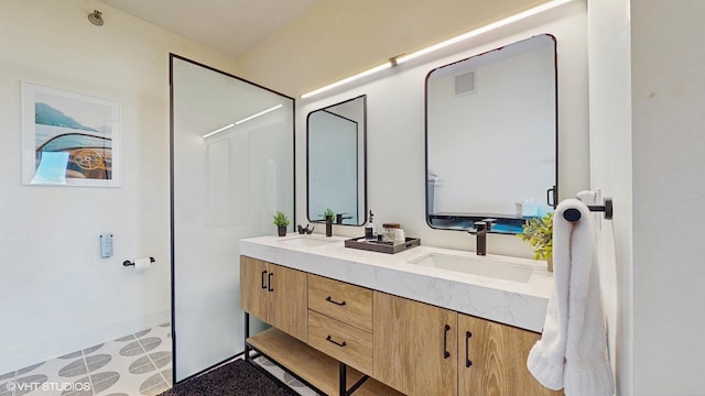 757 N Orleans St Unit 907, Chicago, IL 60654 - full bathroom with double vanity and tile patterned floors