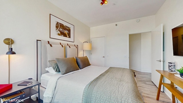 757 N Orleans St Unit 907, Chicago, IL 60654 - bedroom with light wood-style floors