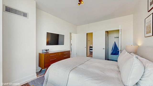 757 N Orleans St Unit 907, Chicago, IL 60654 - bedroom with baseboards