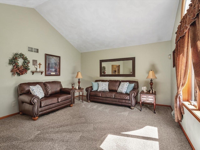 12828 Menominee Trl, Roscoe, IL 61073 - living room with vaulted ceiling and carpet floors