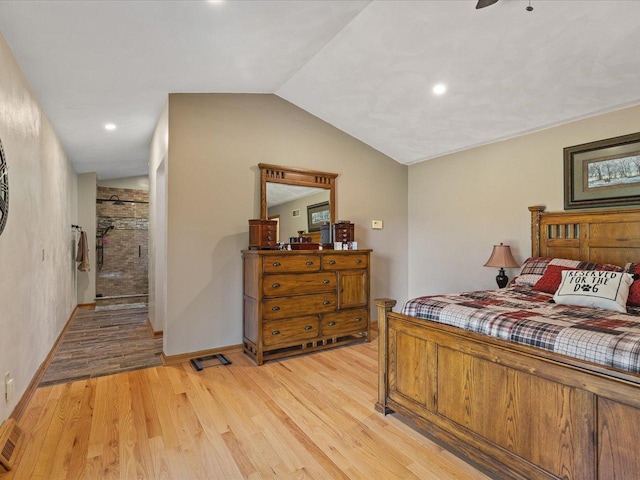 12828 Menominee Trl, Roscoe, IL 61073 - bedroom featuring light wood finished floors, vaulted ceiling, and recessed lighting