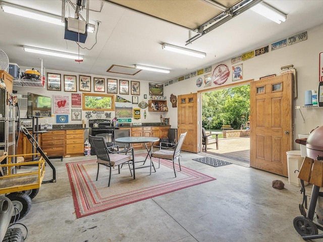 12828 Menominee Trl, Roscoe, IL 61073 - garage featuring a garage door opener