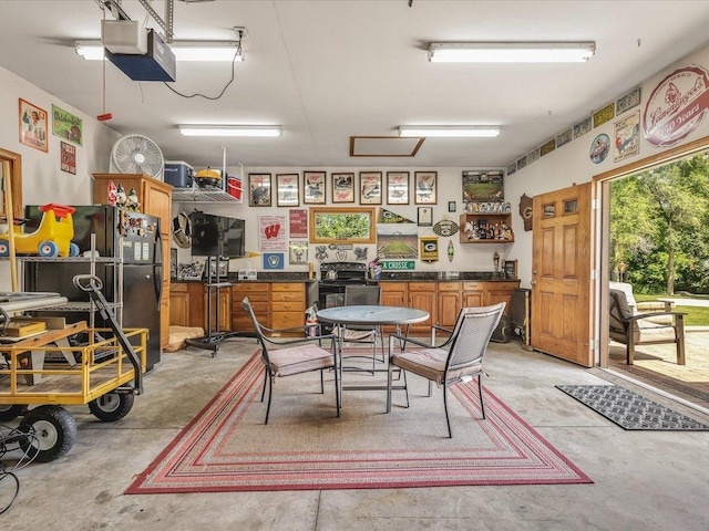 12828 Menominee Trl, Roscoe, IL 61073 - garage featuring a garage door opener