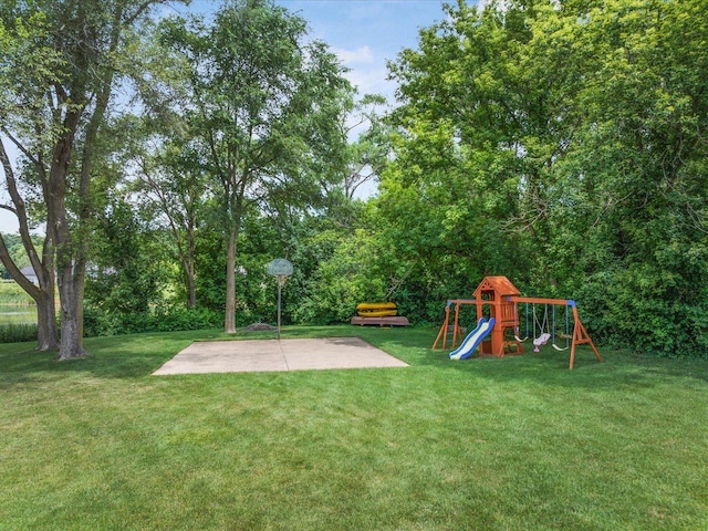 12828 Menominee Trl, Roscoe, IL 61073 - view of grassy yard with a playground
