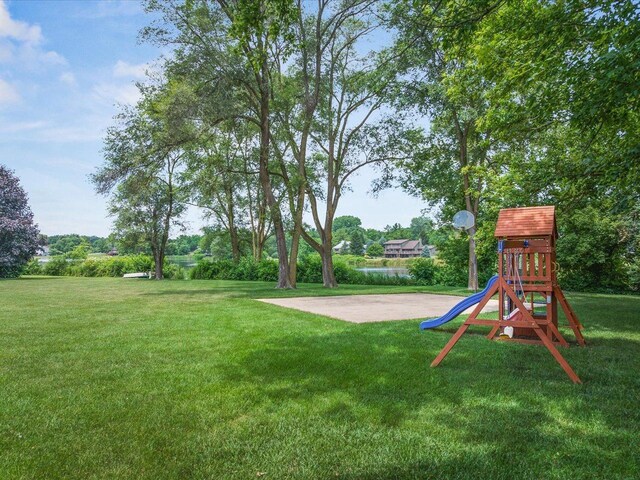 12828 Menominee Trl, Roscoe, IL 61073 - view of grassy yard featuring a playground