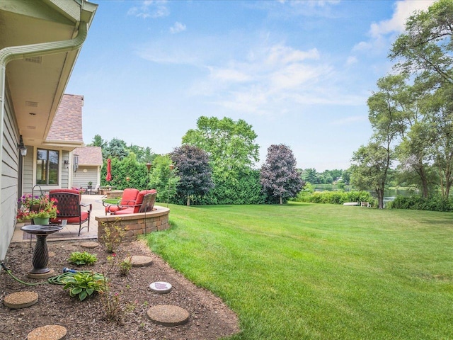 12828 Menominee Trl, Roscoe, IL 61073 - view of green lawn with a patio