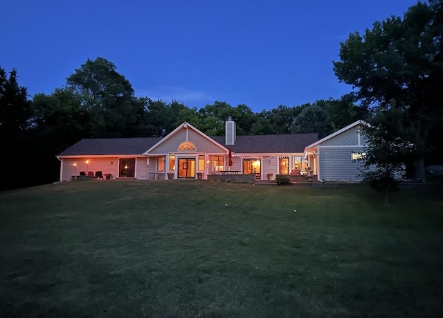 12828 Menominee Trl, Roscoe, IL 61073 - ranch-style house featuring a front yard and a chimney