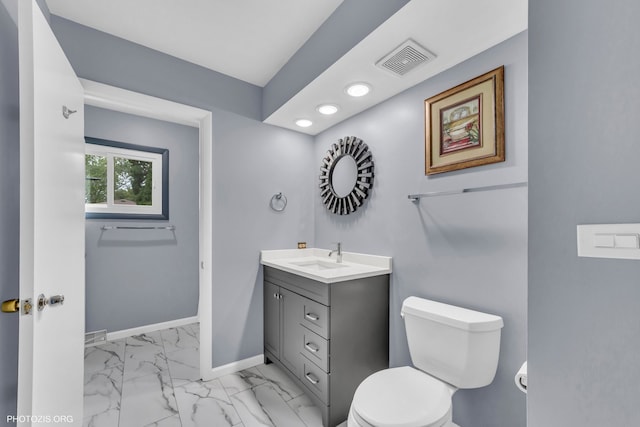 445 Kinkaid Ct, Des Plaines, IL 60016 - bathroom featuring vanity, marble finish floors, and recessed lighting
