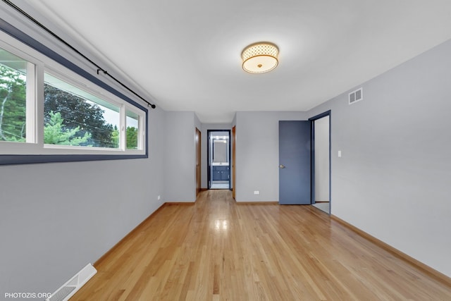 445 Kinkaid Ct, Des Plaines, IL 60016 - spare room with light wood-style floors and baseboards