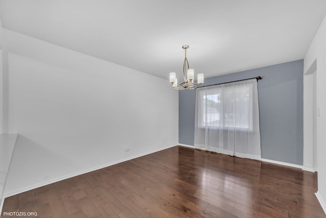 445 Kinkaid Ct, Des Plaines, IL 60016 - spare room with a chandelier and wood finished floors