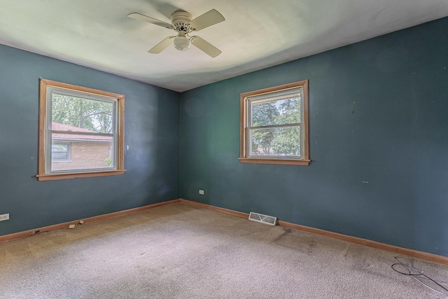 1481 Bloomingdale Rd, Glendale Heights, IL 60139 - spare room featuring plenty of natural light, carpet flooring, and ceiling fan