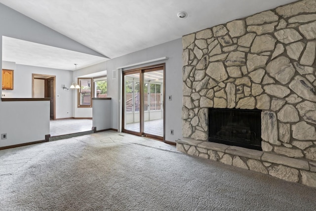 1485 Bryn Mawr Ln, Rockford, IL 61107 - unfurnished living room with light colored carpet, lofted ceiling, a stone fireplace, and a chandelier