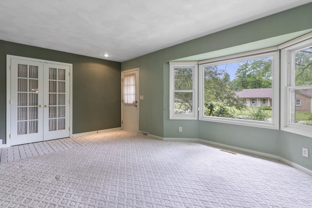 1485 Bryn Mawr Ln, Rockford, IL 61107 - unfurnished sunroom with french doors