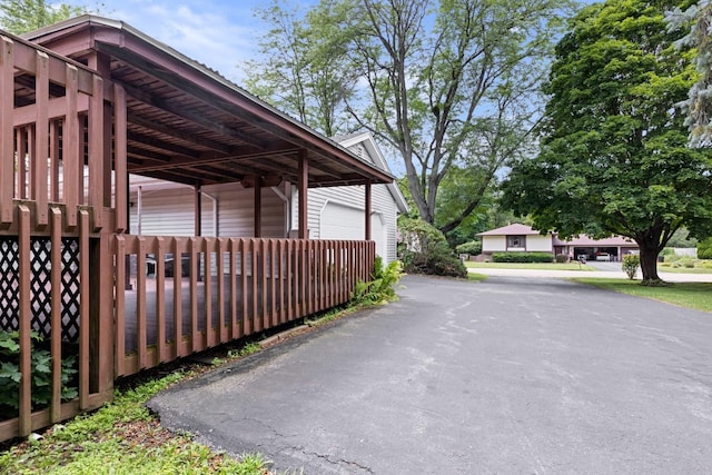 1485 Bryn Mawr Ln, Rockford, IL 61107 - view of side of home featuring a carport