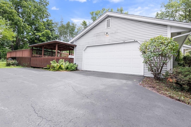 1485 Bryn Mawr Ln, Rockford, IL 61107 - view of property exterior with asphalt driveway