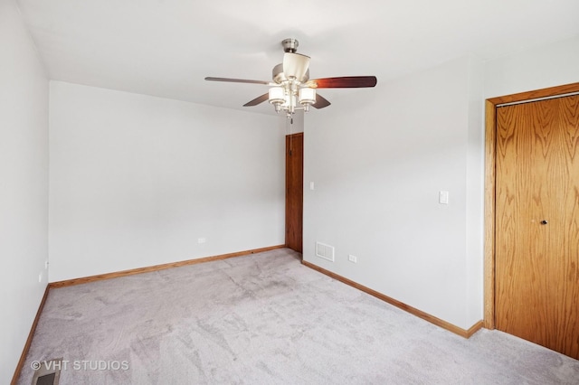 7241 N Mcvicker Ave, Chicago, IL 60646 - carpeted spare room with ceiling fan and baseboards