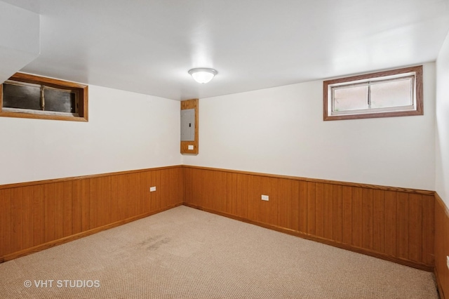 7241 N Mcvicker Ave, Chicago, IL 60646 - unfurnished room with wainscoting, carpet flooring, wooden walls, and electric panel