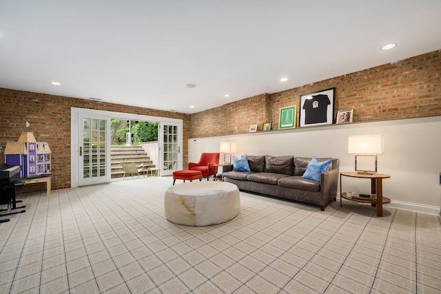 2131 W Schiller St, Chicago, IL 60622 - living area with brick wall, recessed lighting, and light tile patterned flooring