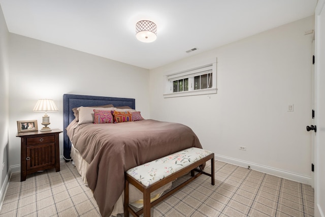 2131 W Schiller St, Chicago, IL 60622 - bedroom with baseboards and light tile patterned flooring