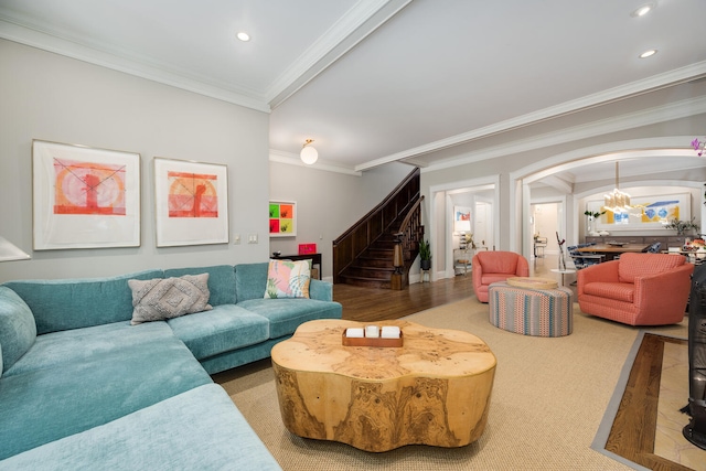 2131 W Schiller St, Chicago, IL 60622 - living room with stairway, arched walkways, ornamental molding, recessed lighting, and wood finished floors