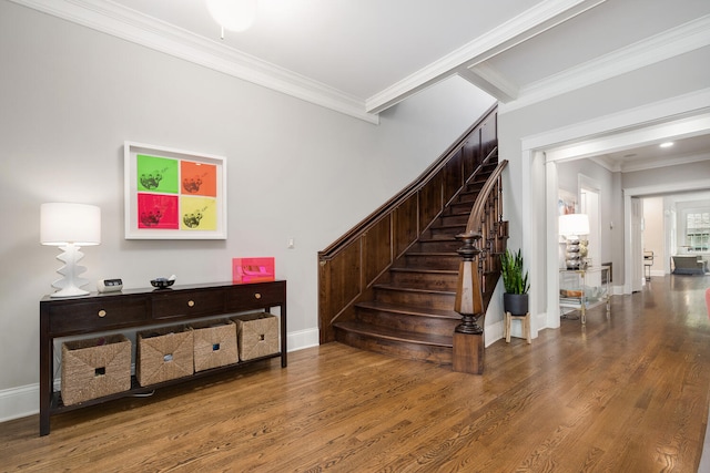 2131 W Schiller St, Chicago, IL 60622 - staircase featuring wood finished floors and crown molding