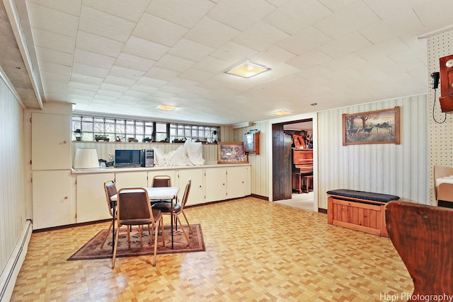 3914 N Richmond Rd, Johnsburg, IL 60051 - dining area with a baseboard radiator and light floors