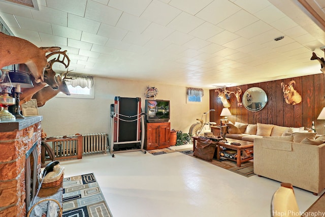 3914 N Richmond Rd, Johnsburg, IL 60051 - living room featuring wood walls and concrete floors