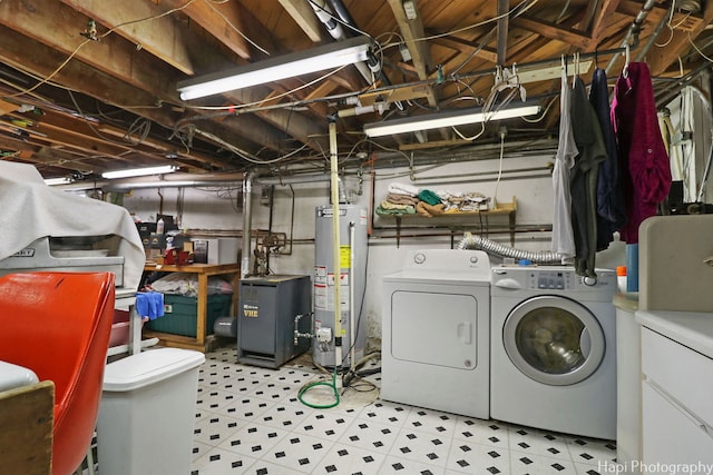3914 N Richmond Rd, Johnsburg, IL 60051 - unfinished basement with water heater, separate washer and dryer, and tile patterned floors