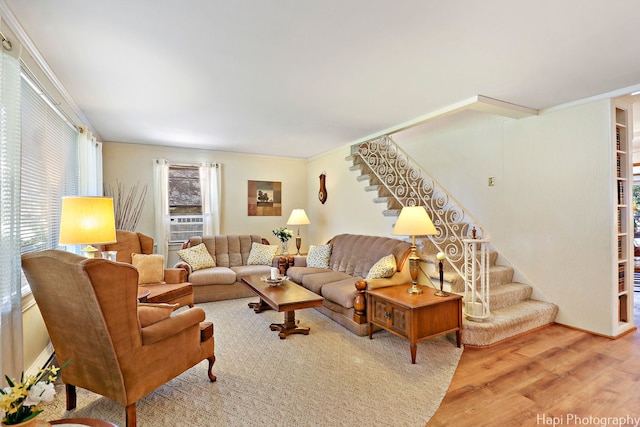 3914 N Richmond Rd, Johnsburg, IL 60051 - living area featuring stairs, wood finished floors, and ornamental molding