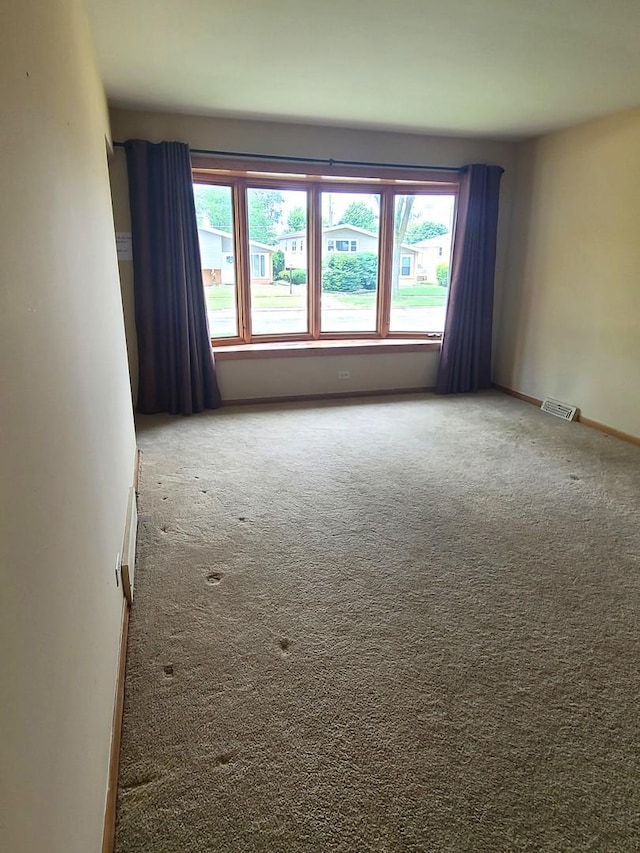 3623 Hawthorne St, Franklin Park, IL 60131 - carpeted spare room featuring baseboards