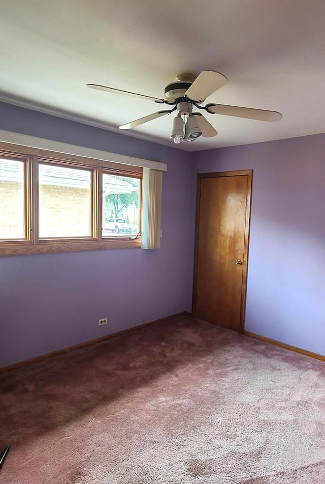 3623 Hawthorne St, Franklin Park, IL 60131 - empty room featuring carpet flooring and ceiling fan