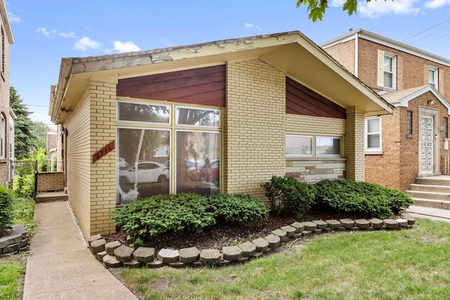 8716 S Merrill Ave, Chicago, IL 60617 - view of side of home with brick siding