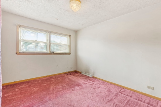 8716 S Merrill Ave, Chicago, IL 60617 - carpeted spare room featuring a textured ceiling