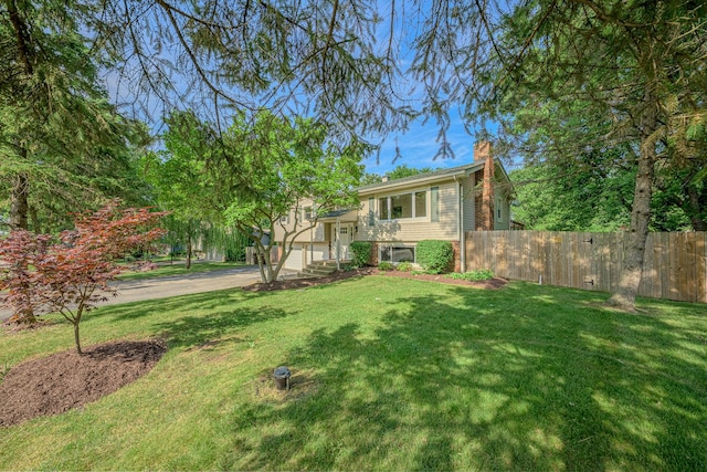214 Somerset Ct, New Lenox, IL 60451 - bi-level home with a chimney, driveway, and a garage