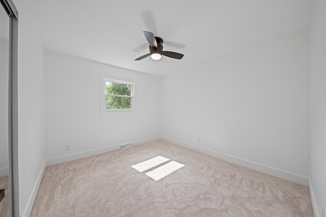 214 Somerset Ct, New Lenox, IL 60451 - carpeted spare room featuring a ceiling fan and baseboards