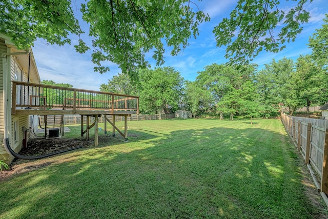 214 Somerset Ct, New Lenox, IL 60451 - fenced backyard featuring a wooden deck and an outbuilding