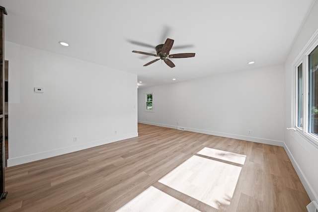 214 Somerset Ct, New Lenox, IL 60451 - spare room with plenty of natural light, ceiling fan, light wood-style flooring, and recessed lighting