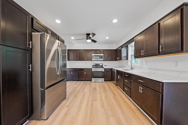 214 Somerset Ct, New Lenox, IL 60451 - kitchen with stainless steel appliances, ceiling fan, light wood finished floors, dark brown cabinetry, and recessed lighting