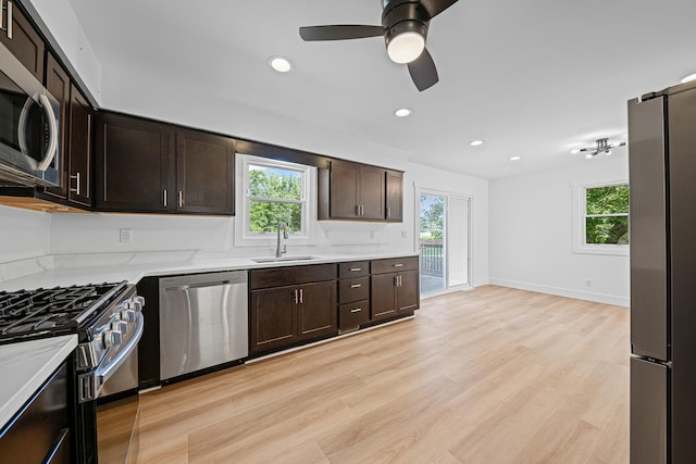 214 Somerset Ct, New Lenox, IL 60451 - kitchen with appliances with stainless steel finishes, plenty of natural light, dark brown cabinetry, and recessed lighting
