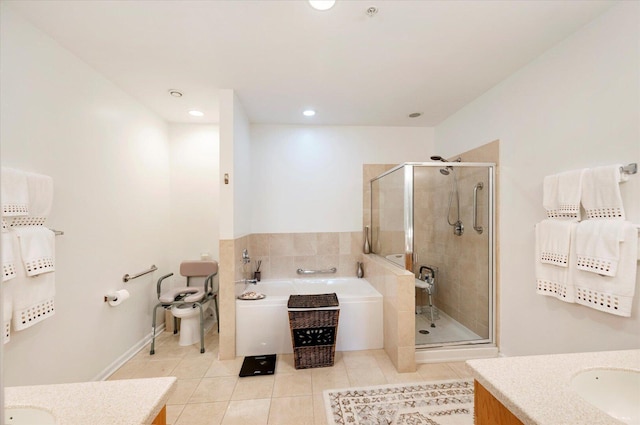 1700 Riverwoods Dr Unit 520, Melrose Park, IL 60160 - bathroom with vanity, tile patterned flooring, a bath, a stall shower, and recessed lighting