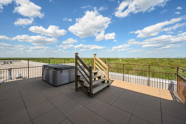 1700 Riverwoods Dr Unit 520, Melrose Park, IL 60160 - view of patio featuring a hot tub and a view of rural / pastoral area