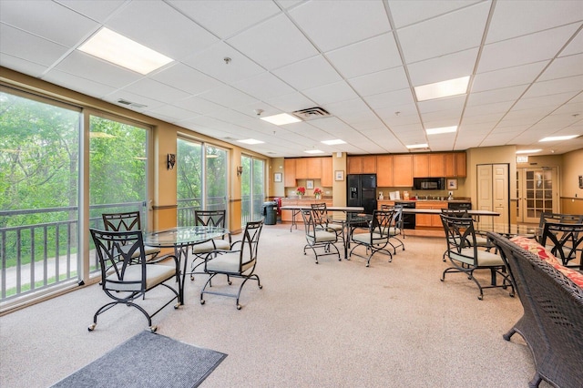 1700 Riverwoods Dr Unit 520, Melrose Park, IL 60160 - dining room featuring plenty of natural light, light carpet, and a paneled ceiling
