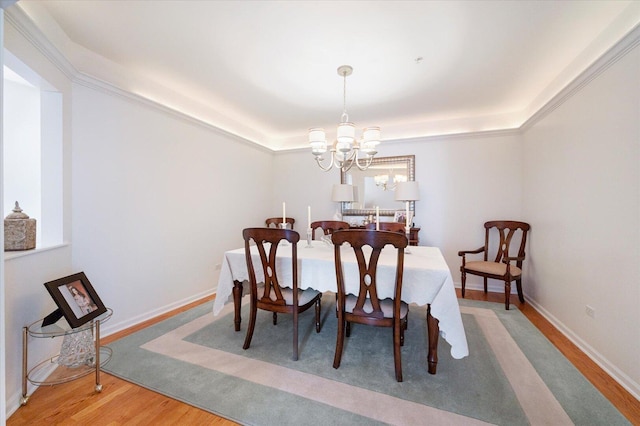 1700 Riverwoods Dr Unit 520, Melrose Park, IL 60160 - dining room featuring light wood finished floors, a tray ceiling, and a chandelier