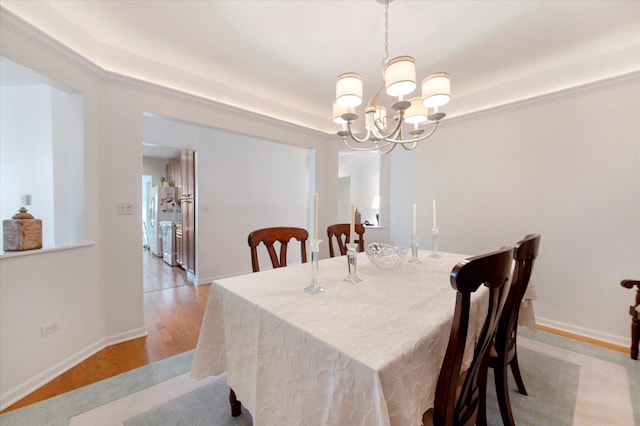 1700 Riverwoods Dr Unit 520, Melrose Park, IL 60160 - dining room with a chandelier and light wood-type flooring