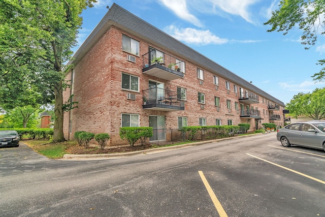 520 Burning Tree Ln Unit 306, Naperville, IL 60563 - view of apartment building / complex featuring uncovered parking